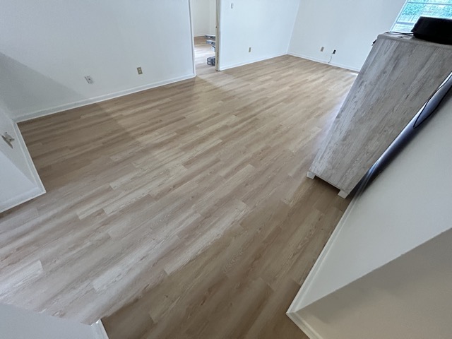 Living Room Before Vinyl Plank and Trim